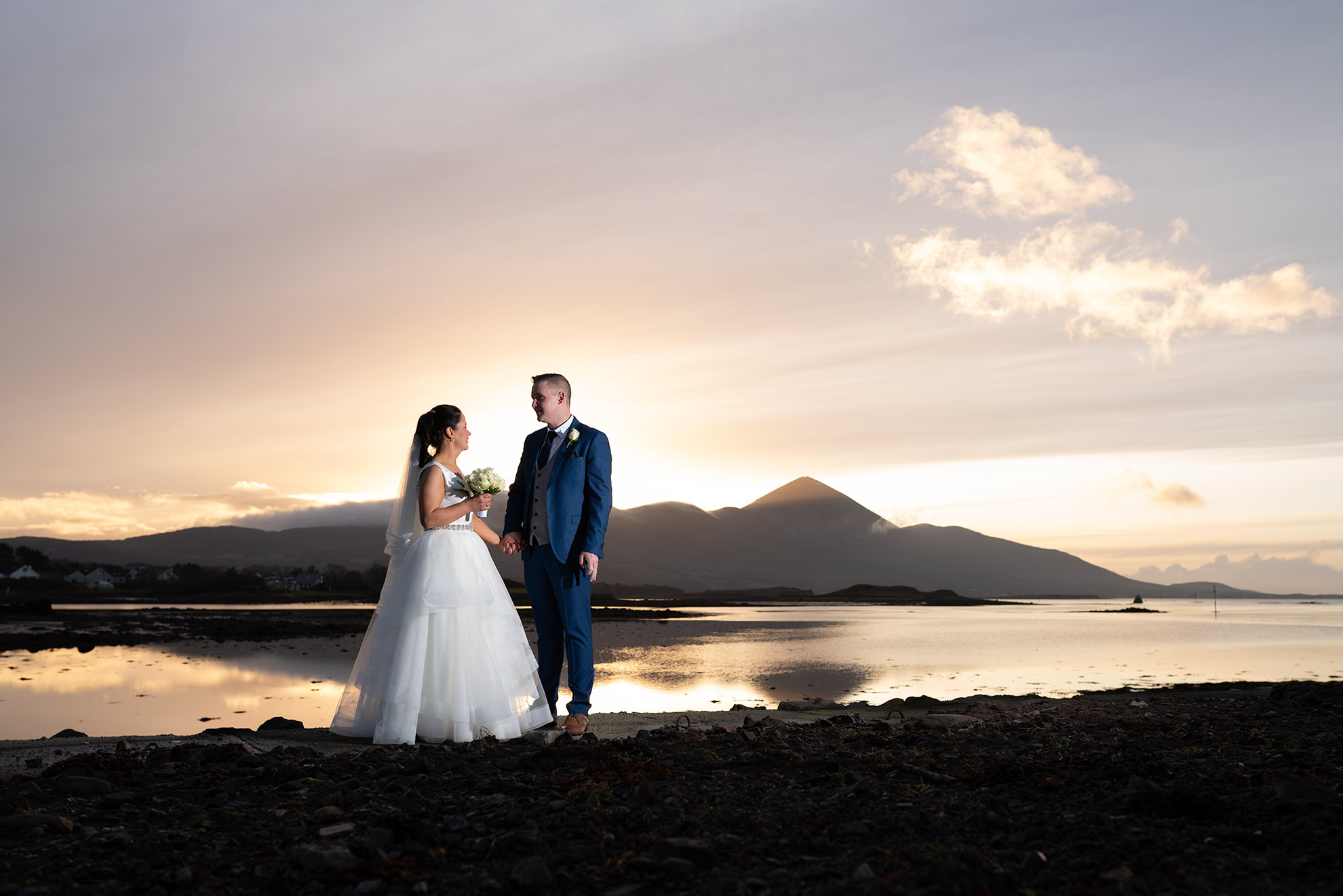 mayo wedding photographer bride and groom in front of a sunset backdrop